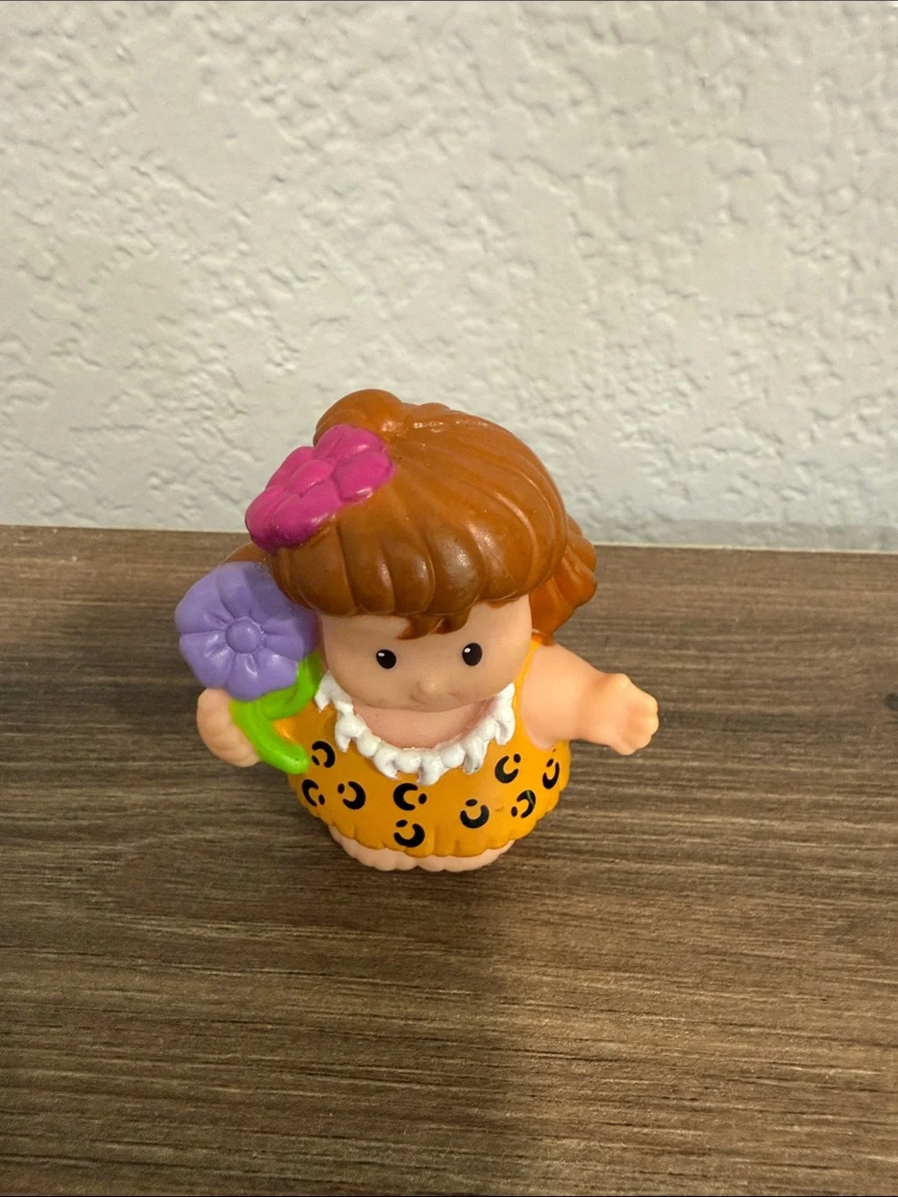 Fisher-Price Little People Cave Woman figure from the Dino Dinoland playset